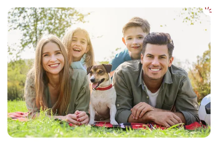 Photo Revila : une famille avec ses enfants et son chien